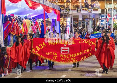 A ceremony procession in Aguas Calientes, Peru, celebrating the anniversary of Machu Picchu being declared a wonder of the world Stock Photo