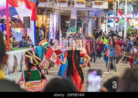 A ceremony procession in Aguas Calientes, Peru, celebrating the anniversary of Machu Picchu being declared a wonder of the world Stock Photo