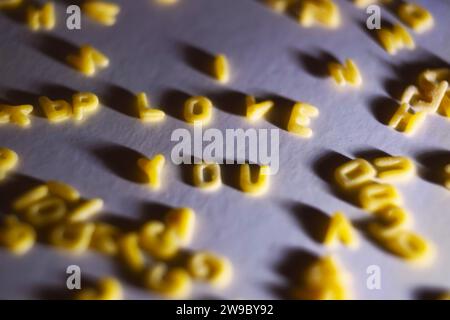 Phrase I LOVE YOU made of dry pasta letters on a white background Stock Photo
