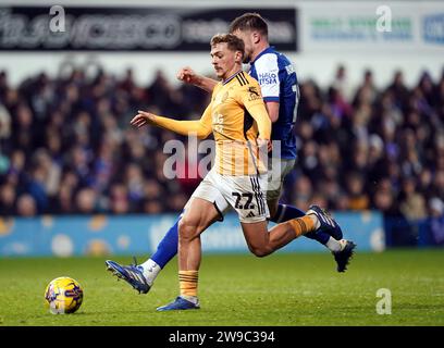 Ipswich Town's Cameron Burgess tackles Leicester City's Kiernan Dewsbury-Hall during the Sky Bet Championship match at Portman Road, Ipswich. Picture date: Tuesday December 26, 2023. Stock Photo