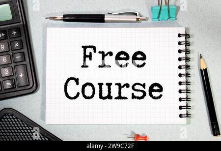 FREE ONLINE COURSE, message on the card shown by a man, vintage tone Stock Photo
