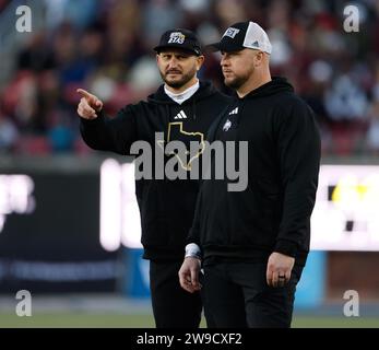 December 26, 2023: Texas State head coach GJ Kinne (left) during the SERVPRO First Responder Bowl game between the Rice Owls and the Texas State Bobcats on December 26, 2023 in Dallas. Making their first-ever bowl game appearance, Texas State won, 45-21. (Credit Image: © Scott Coleman/ZUMA Press Wire) EDITORIAL USAGE ONLY! Not for Commercial USAGE! Stock Photo