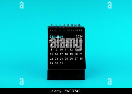 Black Calendar for January 2024 . Desktop calendar on a black color ...