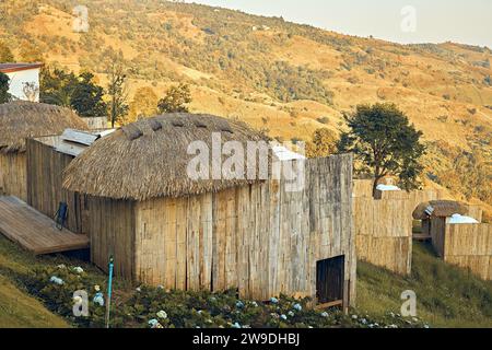 Homestay in the Doi Chang mountains of Chiang Rai Northern Thailand, bamboo wooden hut in the mountains, cottage cabin at sunset in the mountains of N Stock Photo