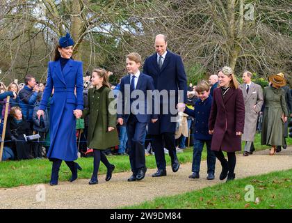 The Prince and Princess of Wales with their children and Mia Tindall arriving at the Church of St. Mary Magdalene, Sandringham on Christmas Day, 2023 Stock Photo