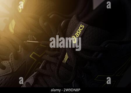 Antalya, Turkey - November 28, 2023: Close-up of the logo on Asics running shoes Stock Photo