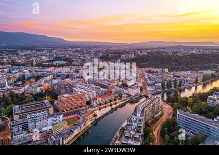 Geneva, Switzerland skyline view from over the river after sunset. Stock Photo