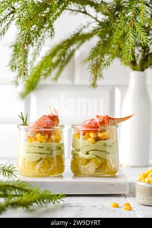 salad in a glass with a crab claw Stock Photo