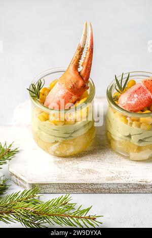 salad in a glass with a crab claw Stock Photo