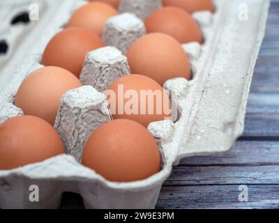 Close up shot of brown eggs in egg carton Stock Photo