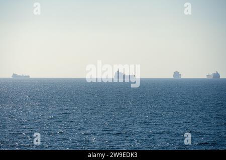 Cargo ships anchored on the Mediterranean Sea in Haifa, Israel Stock Photo