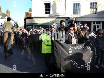 Bungay, Suffolk, UK. 26th Dec, 2023. Hunt protesters hold a Hunt Saboteur Association banner during the demonstration. Action Against Animal Cruelty, protest was held in the town centre, Bungay as the Waveney and Norfolk Harriers parade through the streets supporting the countryfolk. The protesters said that despite their being a ban on traditional fox hunting, animals are still being killed during the trail hunting alternative and they are calling for a total ban. (Credit Image: © Martin Pope/SOPA Images via ZUMA Press Wire) EDITORIAL USAGE ONLY! Not for Commercial USAGE! Stock Photo