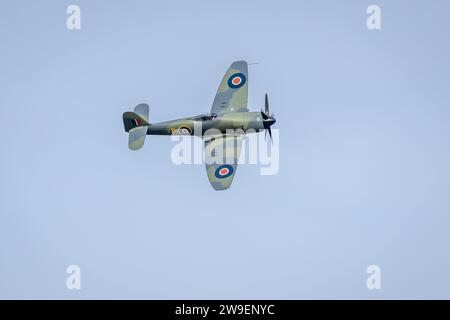 Hawker Fury Mk.II SR611 (G-CBEL) airborne at Shuttleworth Race Day Airshow on the 1st October 2023. Stock Photo