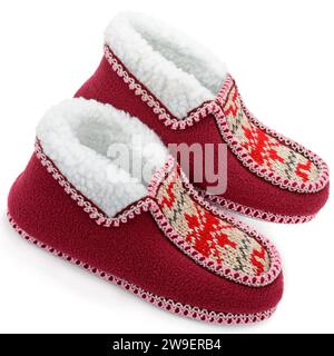 A pair of cozy home slippers isolated on a white background. Stock Photo
