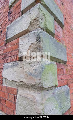 masonry quoins or cornerstones in stable block Stock Photo