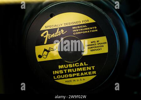 View of the back side of a Fender tube amp or amplifier speaker as viewed through the open slots in the back of the cabinet. Fender musical instrument Stock Photo
