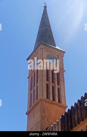 Zanzibar, Tanzania - July 18, 2017: Clock and bell tower at Christ church Anglican Cathedral in Stone Town. Stock Photo