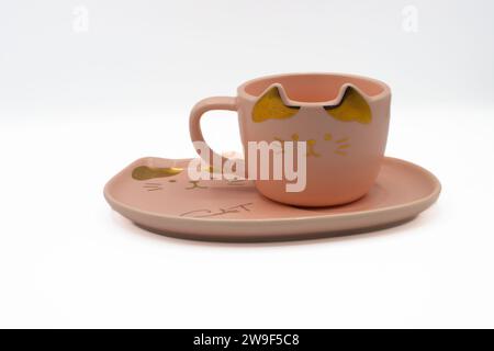 Cute cat tea, coffee cup on a saucer Stock Photo