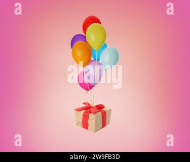 Many balloons tied to gift box on pink background Stock Photo