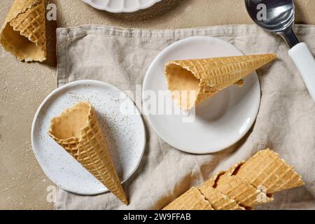 empty ice cream waffle cones on kitchen table, top view Stock Photo