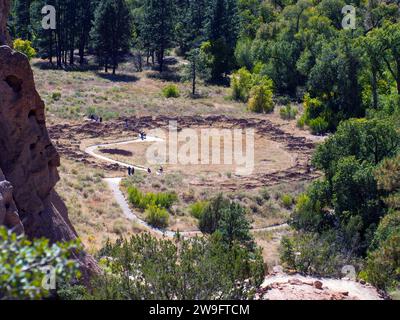 Bandelier National Monument, New Mexico, United States - November 8, 2019: Tyuonyi village ruins. Wide shot from the cliff. Stock Photo