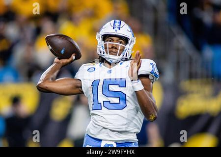 Charlotte, NC, USA. 27th Dec, 2023. North Carolina Tar Heels quarterback Conner Harrell (15) throws against the West Virginia Mountaineers in the 2023 Duke's Mayo Bowl at Bank of America Stadium in Charlotte, NC. (Scott Kinser/CSM). Credit: csm/Alamy Live News Stock Photo