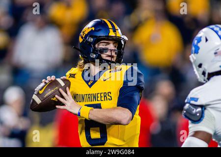 Charlotte, NC, USA. 27th Dec, 2023. West Virginia Mountaineers quarterback Garrett Greene (6) throws against the North Carolina Tar Heels in the 2023 Duke's Mayo Bowl at Bank of America Stadium in Charlotte, NC. (Scott Kinser/CSM). Credit: csm/Alamy Live News Stock Photo