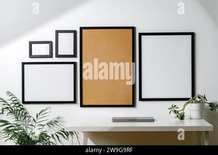 Set of black frames on white wall with copy space Stock Photo