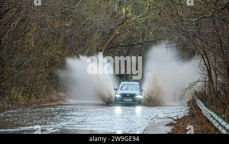 Weather, Storm Gerrit Torrential rain and strong winds from Storm Gerrit have been battering the, UK. 27th Dec, 2023. today. Drivers tackle tricky driving conditions as the A7 near Stow in the Scottish Borders becomes flooded under several inches of rain. Picture Credit: phil wilkinson/Alamy Live News Stock Photo