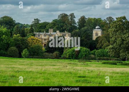 Gayhurst Court and the tower of the church of St Peter, viewed from across adjoining fields; Gayhurst, Buckinghamshire, UK Stock Photo