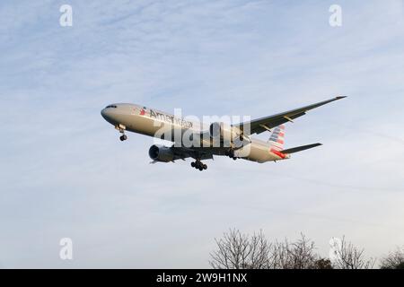 American Airlines Boeing 777-323ER Passenger Jet Airplane Registration N720AN on short finals for a landing on runway 27L at Heathrow Airport Stock Photo