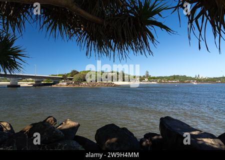 View from Ballina Skate Park across Richmond River to Gawandii Beach on a sunny day Stock Photo