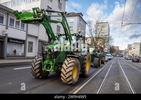 Kassel, Germany, 28. December 2023, Around 100 farmers from northern Hesse demonstrated in Kassel city centre on Thursday (28 December) against the government's plans. After a tractor convoy around the city centre, more than 60 tractors parked in front of the Kassel Regional Council. The farmers then met in front of Kassel's town hall to talk to the public. Farmer Marc Sprenger (49, Staufenberg-Escherode): 'If the traffic light government abolishes the tax-free number plates and the agricultural diesel subsidies, there will be a market distortion in Europe. Families will have to absorb this, t Stock Photo