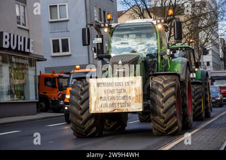 Kassel, Germany, 28. December 2023, Around 100 farmers from northern Hesse demonstrated in Kassel city centre on Thursday (28 December) against the government's plans. After a tractor convoy around the city centre, more than 60 tractors parked in front of the Kassel Regional Council. The farmers then met in front of Kassel's town hall to talk to the public. Farmer Marc Sprenger (49, Staufenberg-Escherode): 'If the traffic light government abolishes the tax-free number plates and the agricultural diesel subsidies, there will be a market distortion in Europe. Families will have to absorb this, t Stock Photo