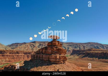 Composite image of Mexican Hat Rock in Utah, double-exposed with the annular eclipse on 14 October 2023.  Mexican Hat Rock was very near the center of Stock Photo