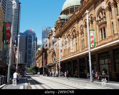 View looking along George Street at the Queen Victoria Building QVB in Sydney Australia on a bright sunny spring day in November Stock Photo