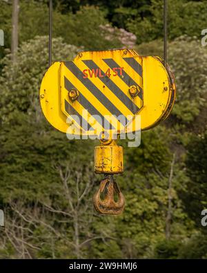 The hook block on a shipboard crane of the AS Sabine Stock Photo