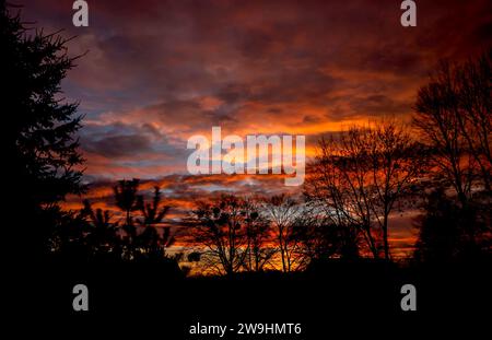 Dramatic sunset winter time in small town Stock Photo