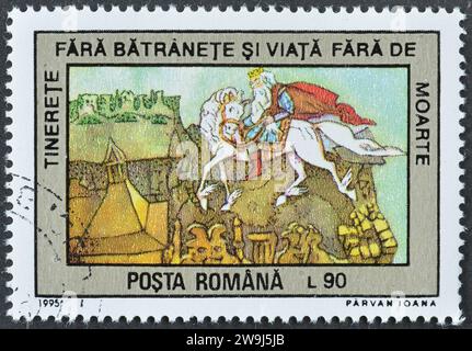 Cancelled postage stamp printed by Romania, that shows Youth without Age and Life without Death, Fairy Tales, circa 1995. Stock Photo