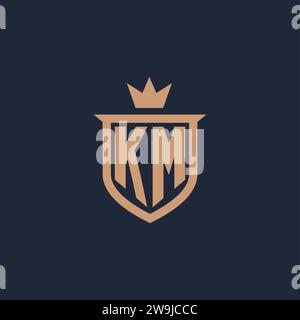 KM monogram initial logo with shield and crown style design ideas Stock Vector
