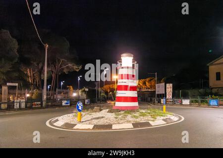 La Spezia, Italy, July 27, 2023. Roundabout with a lighthouse at night Stock Photo