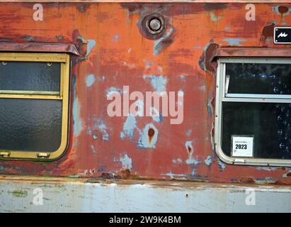 seen better days! - fading peeling paint produces lifestyle image of neglected alternative canal-boat life on the inland waterways of England Stock Photo