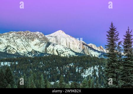 pre-dawn sky over sacagawea peak in the bridger mountains in winter near bozeman, montana Stock Photo