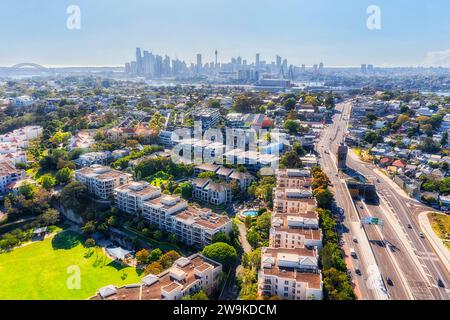 Sydney city skyline from Rozelle Inner west suburb - entrance to new Westconnex transport motorway tunnel from Victoria road Rozelle Interchange. Stock Photo