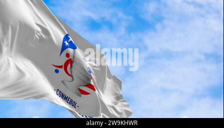 Miami, US, Dec. 23 2023: Copa America USA 2024 Flag waving on a clear day. International men soccer championship.The 2024 edition will be hosted by US Stock Photo