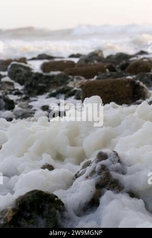 Freshwater Bay, Totland. 28th December 2023. Storm force winds from Storm Gerrit hit the Isle of Wight yesterday and overnight. Large waves, high gusts of wind and sea foams were some of the hazards that continued today at the beach. Credit: james jagger/Alamy Live News Stock Photo