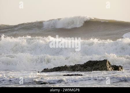 Freshwater Bay, Totland. 28th December 2023. Storm force winds from Storm Gerrit hit the Isle of Wight yesterday and overnight. Large waves, high gusts of wind and sea foams were some of the hazards that continued today at the beach. Credit: james jagger/Alamy Live News Stock Photo