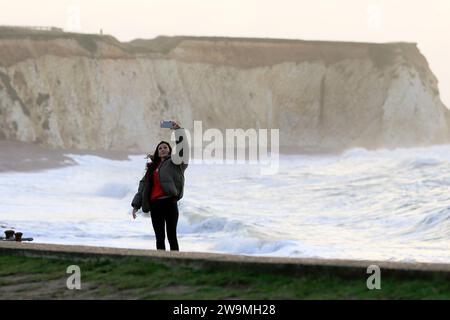 Freshwater Bay, Totland. 28th December 2023. Storm force winds from Storm Gerrit hit the Isle of Wight yesterday and overnight. Large waves, high gusts of wind and sea foams were some of the hazards that continued today at the beach. Credit: james jagger/Alamy Live News Stock Photo