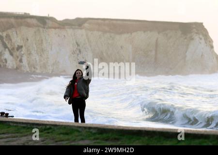 Freshwater Bay, Totland. 28th December 2023. Storm force winds from Storm Gerrit hit the Isle of Wight yesterday and overnight. Large waves, high gusts of wind and sea foams were some of the hazards that continued today at the beach. Credit: james jagger/Alamy Live News Stock Photo