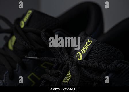 Antalya, Turkey - November 28, 2023: Close-up of the logo on Asics running shoes Stock Photo